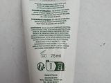 a tube of toothpaste sitting on a counter