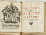 un livre ouvert sur lequel est représenté un blason