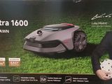 an image of a man standing next to a box of lawn mowers