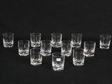 a group of glasses sitting on top of a black table