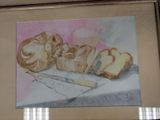 a picture of a painting of bread and butter on a table