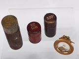 a glass display case with some old items on it