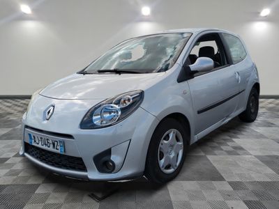 a picture of a small silver car in a room
