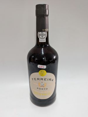 a bottle of wine that is sitting on a table