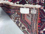 an image of a close up of a rug with a tag on it