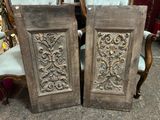 pair of antique carved wood doors with ornate designs