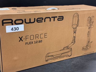 the box of a vacuum cleaner is sitting on a table