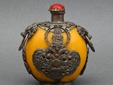 flasque jaune et argentée, surmontée d'une couronne