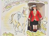 une poupée qui se trouve dans une boîte sur laquelle est représenté un cheval