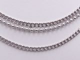 silver plated chain necklaces with round links on a white background