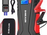 a close up of a car jump battery charger with a digital display