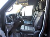 a view of the inside of a truck with the driver ' s seat up