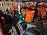 a tractor that is parked in a garage