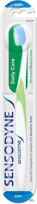 une image représentant une brosse à dents et un tube de dentifrice sur fond blanc
