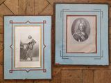 two framed pictures of a man and a woman on a wooden wall