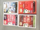 three boxes of chinese food sitting on top of a refrigerator