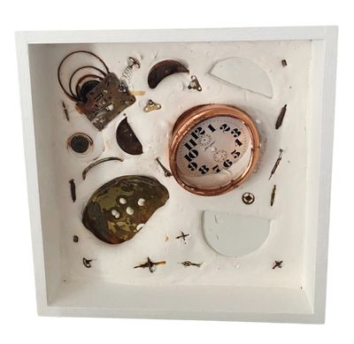 a picture of a picture of a clock in a shadow box