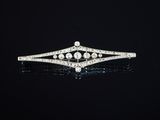une broche en diamant et or blanc