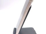 a cell phone that is sitting on top of a stand