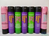 the bottles of matrix color care are lined up on the table