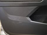 a close up of a car door handle with a sticker on it