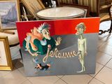 une photo d'un tableau représentant un homme et une femme posés sur une table