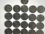 a lot of coins that are sitting on a table