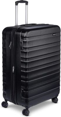a close up of a black suitcase with wheels on a white background