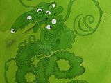 une image représentant un dessin d'un dragon vert sur fond vert