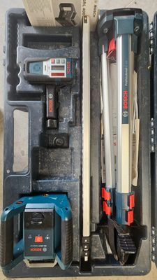 a box with tools in it sitting on the floor