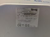a label on the back of a toilet seat