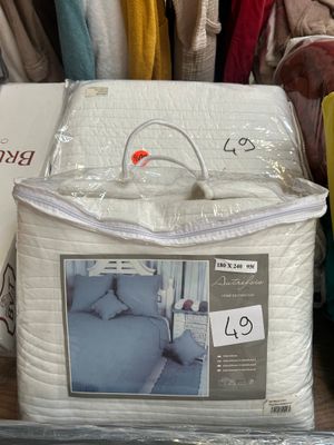 a box of pillows and a pillow case on a table