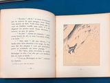 an open book with a picture of a deer on it