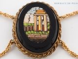 a picture of a necklace with a picture on it