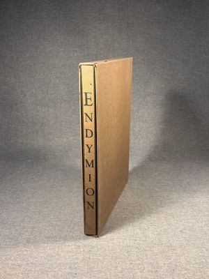 the end of a book is sitting on a table with a gray background