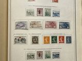 an open book with a picture of stamps on it