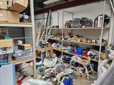 a room filled with lots of clutter and other items