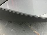 a close up of a car ' s front bumper