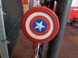 a captain ' s shield on the back of a bike