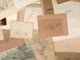 a pile of old papers that are on a table