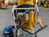 a machine that is sitting in the middle of a warehouse
