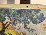 a picture of a painting on a easel with a painting on it