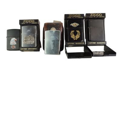 several different types of lighters are lined up on a white surface