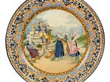 a plate with a painting on it of a group of people