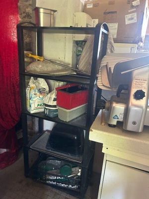 a shelf that has a bunch of items on it
