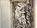 un vieux livre sur lequel figure le dessin d'une femme tenant un drapeau
