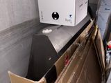 a box that is sitting on top of a refrigerator