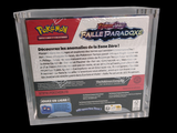 a box of pokemon trading cards on a black background