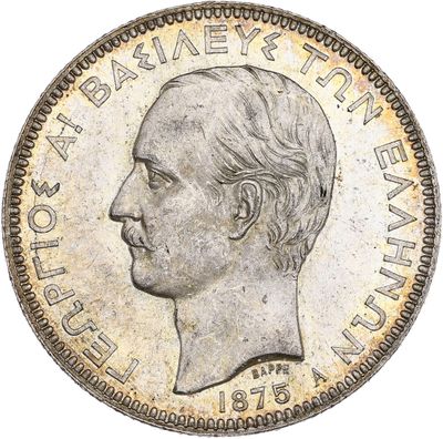 Gros plan sur une pièce de monnaie portant le visage d'un homme