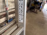 a picture of a metal door with a sign on it